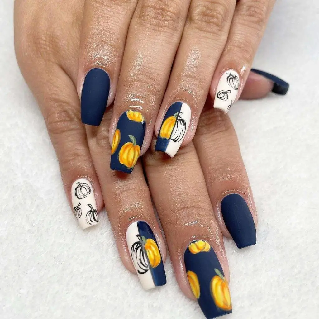 Matte Blue And White Nails With Pumpkin Design