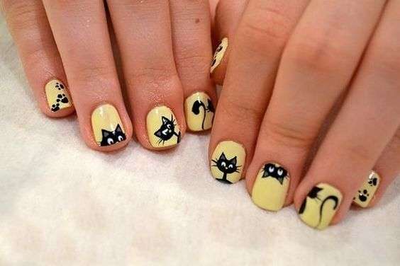 yellow cat nail art