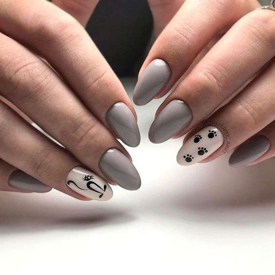 grey and pink cat nail art