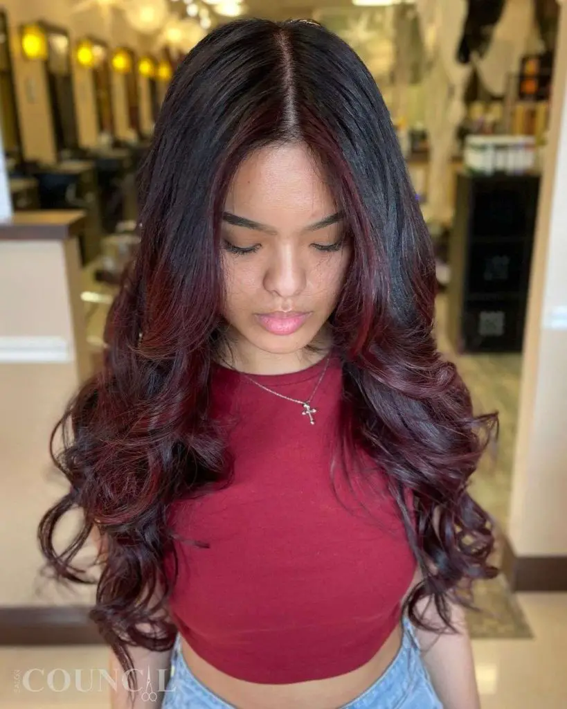 deep red hair with dark roots
