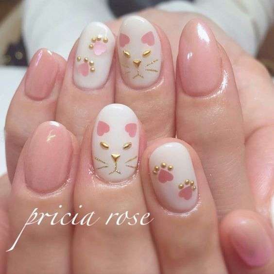 cat nail art pink and gold