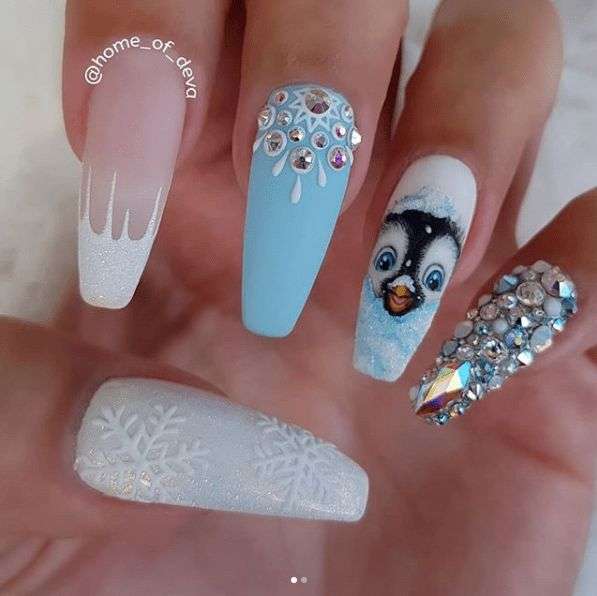 nail art inspo christmas themed nails snowflakes penguin