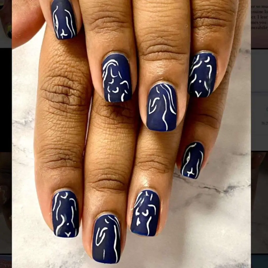 Abstract Female Figures On Matte Navy Blue Nails 