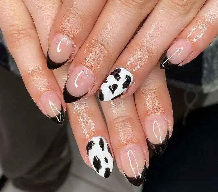 Nude Nails With One Cow Print Design And French Tips
