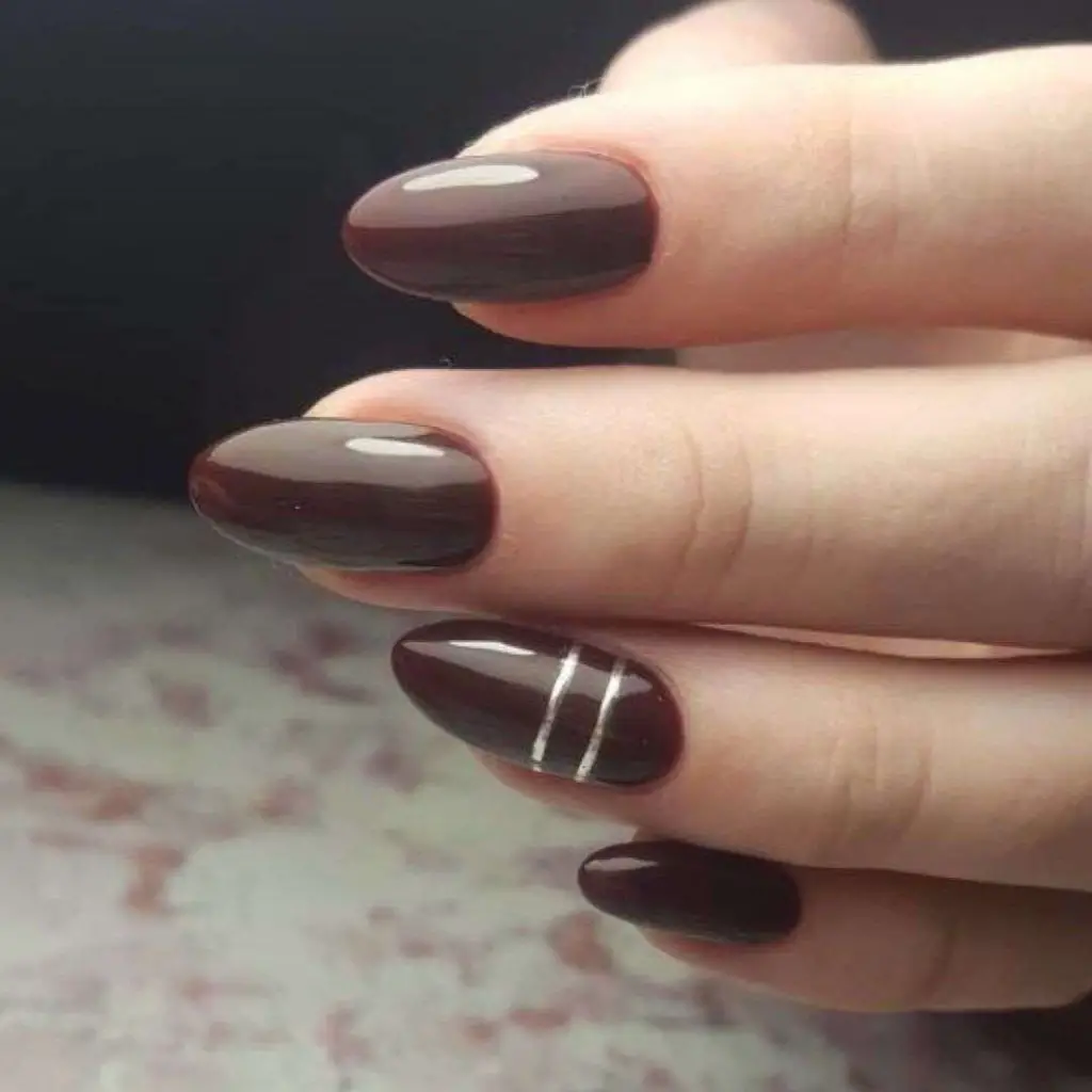 Elegant Brown Almond Nails With Silver Stripes