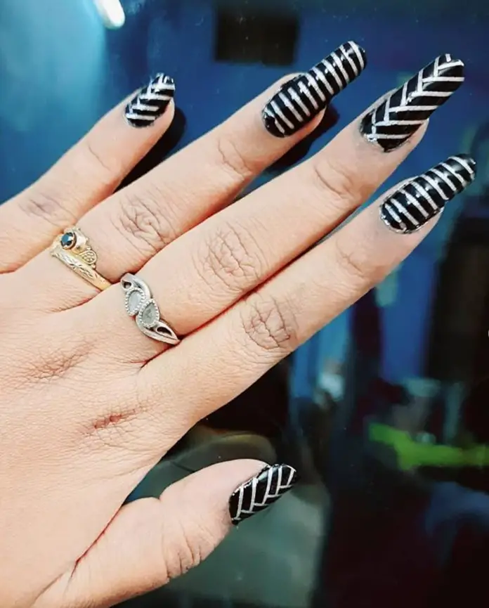Geometric Pattern Black And Silver Nails