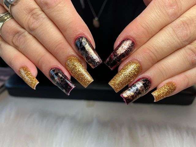Black And Gold Marble Nails