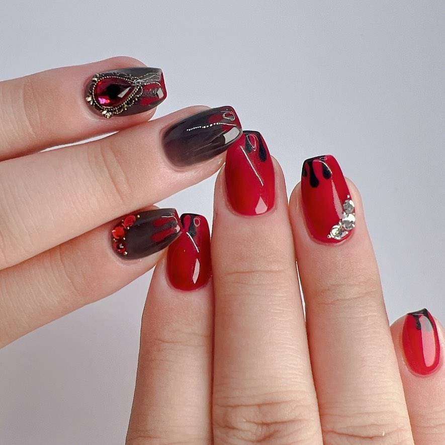 Spooky Red And Black Halloween Manicure