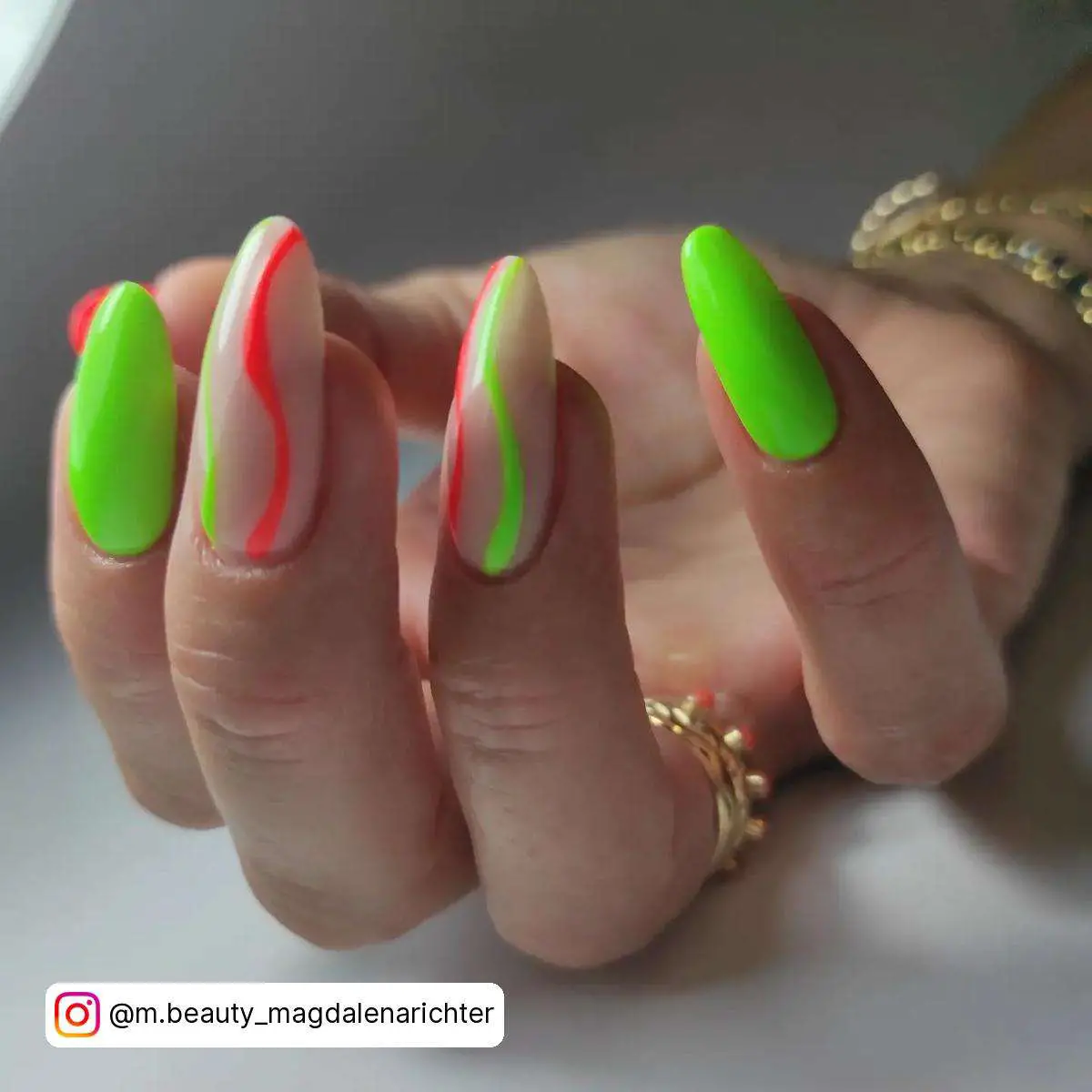 Neon Green And Red Swirl Nails
