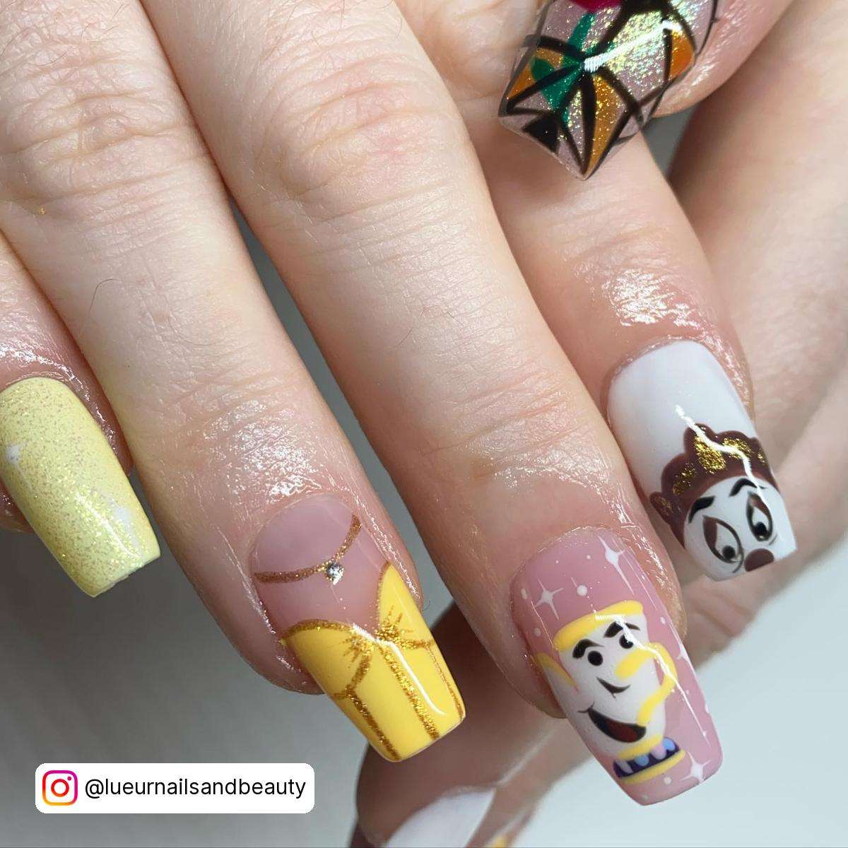 Yellow Beauty And The Beast Nails