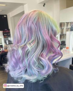 Pearlescent Pastel Pink, Pastel Blue And Pastel Purple Highlights On Platinum Blonde Hair
