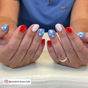 Short And Simple Red White And Blue Nails With Stars