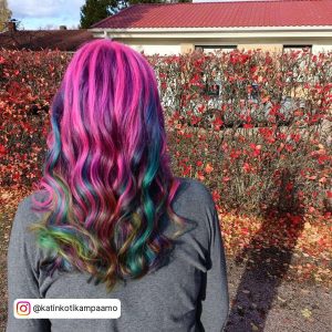 Bright Magenta Pink Hair With Teal, Green And Purple Highlights