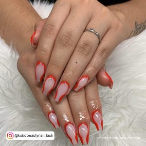 Coffin Red And White Swirl Nails Over Fur Clothe