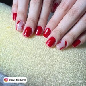 Easy Red White Nails With Swirl Design On A Cream Clothe