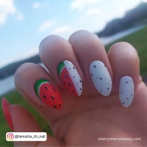 Fruity Almond Red And White Nail Design With Water Melon And Black In White Stamp Design In Front Of Lake