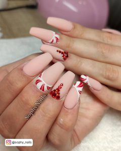 Hot Nude + Red And White Nails With Red Rhinestone And Striped Red And White French Tips On White Towel