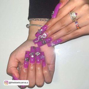 Long Hot Pink Nails With 3D Silver Designs On