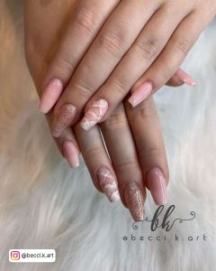 Nude Ballerina Nails With Light Pink Design And Glitter