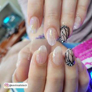 Oval Clear Iridescent Chrome Nails With Black Butterfly Wing Design