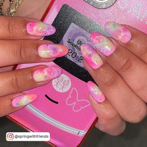 Pastel Pink, Pastel Orange, Pastel Purple And Pastel Yellow Blended Nails With Cute Pink Designs
