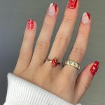 Red And White Christmas Nails With Rhinestones, French Tips, And Star Designs