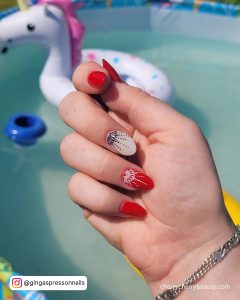 Short Boho Red And White Nails With Children Swimming Pool Background
