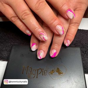 Short Hot Pink, Nude And Gold Glitter Swirl Nails