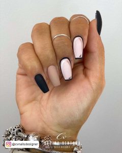 Short Matte Black And Nude Ballerina Nails With Two Pink And Black Cartoon Nails