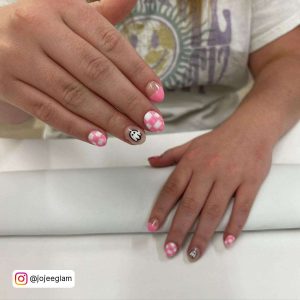 Short Pink And White Check Nails With White Ghost Nail And Half Pink Half Nude Nail