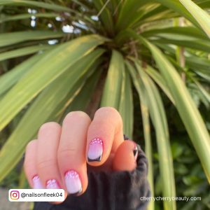 Short Pink Red White Nails With French Tips With Palm Tree Background