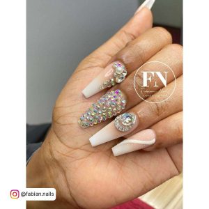 White And Nude Ombre French Tip Ballerina Nails With One Crystal Nail And Crystal Decoration