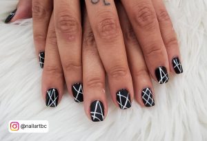 Black Square Tip Nails With White Line Design On Each Nail