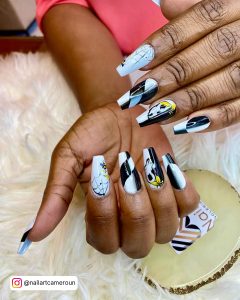 Black White Nails With Optical Illusion And Ombre, Checkered, And Spiderweb Design On Fur