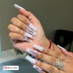 Classy And Long White Coffin Nails With Diamonds