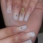 Coffin Nude And White Ombre Nails With Diamonds And Rhinestones
