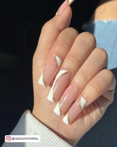 Coffin Nude Nails With White Accent And Gold Glitter Stripes