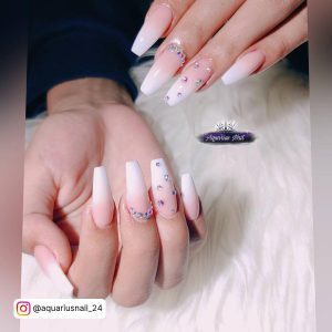 Coffin Pink And White Ombre Nails With Rhinestones On White Clothe