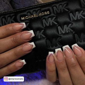 Coffin White French Tip Nails On A Michael Kors Bag