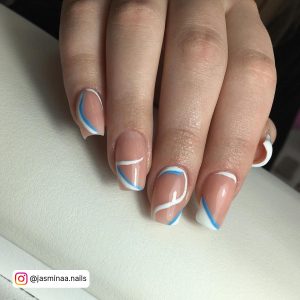 Easy Abstract Blue And White Nails Ideas On Nude Base Over White Surface