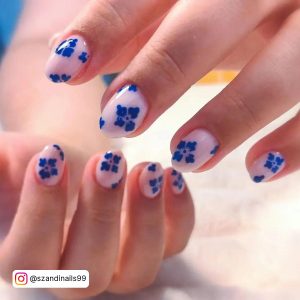 Elegant Nude White Nails With Blue Flowers