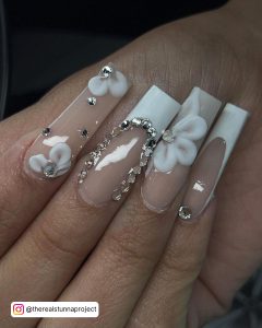 Flowery Acrylic Nails With White Tips And Diamonds