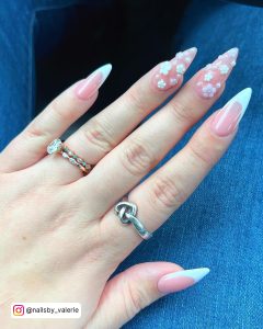 Flowery White French Tip Almond Nails
