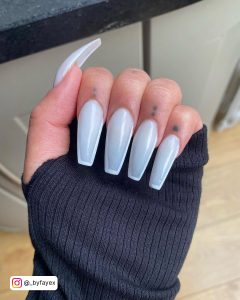 French Milky White Acrylic Nails On Black Sleeves