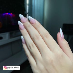 French Tip White Nails With A Different Design On One Finger