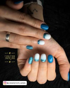 Glittery Blue And White Nails Short, With Plain Blue And Reverse Tips Design