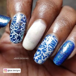 Glittery Blue Nails With White Heart And Plain White Nails And White Nails With Love Inscriptions