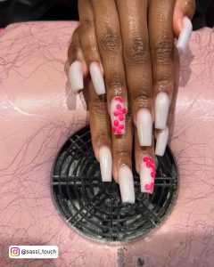 Glow-In-The-Dark Hot Pink And White Acrylic Nails With 3D Flower Design
