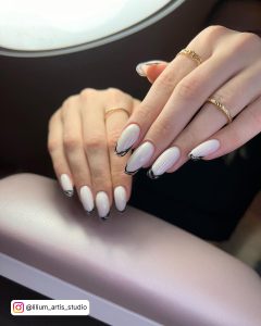 Gorgeous Milky White Gel Nails With Zebra-Print Tips