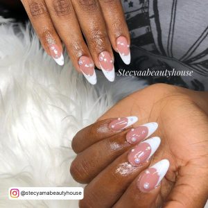 Gorgeous White Tips Nails With Pearls On White Fur